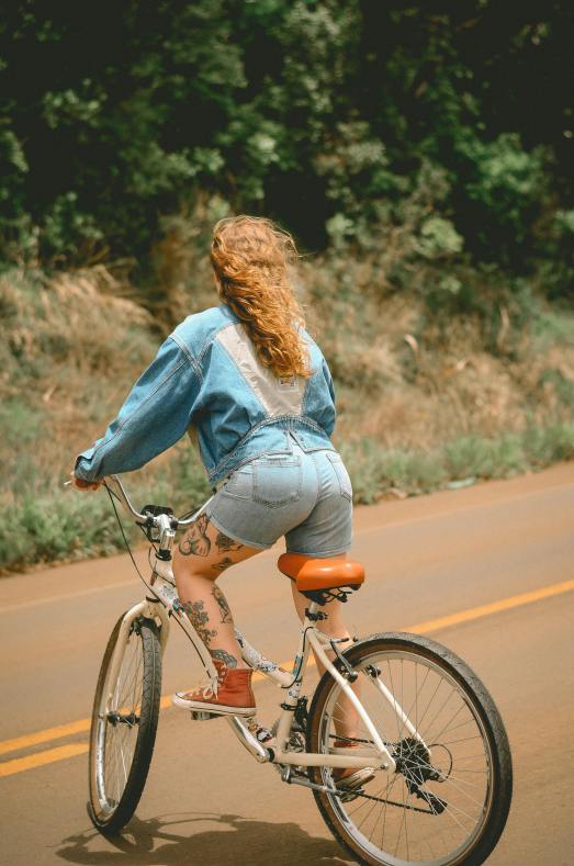 woman-riding-white-bicycle-2829533